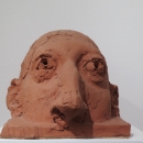 Glava koja izranja, 1996.; terakota